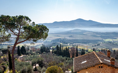 Fototapeta na wymiar Pienza in Tuscany, Italy. UNESCO heritage village, view of the surrounding hills. Protected by high walls, it is famous for the 