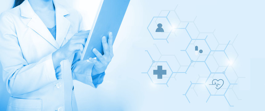 woman young  doctor hand holding blur tablet shows a list of patients and icon medical network connection on virtual screen interface.Vaccination concept. laboratory, medical and healthcare