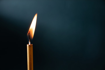 Lit candle