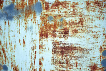 Rust metal texture with peeling paint, blue color. Textural background, copy space, shot from above. text underlay.