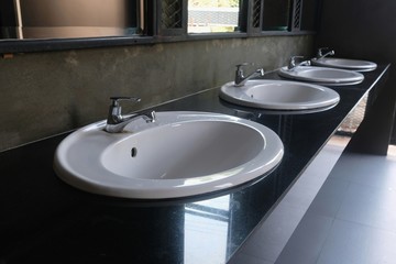 select focus first water tap, white sinks in toilet