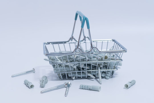 Screws and dowls in a shopping basket