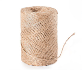 Ball of jute twine closeup on a white background isolated