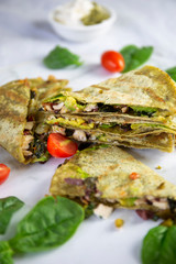 Chicken Quesadilla with avocado, tomatoes and jalapeno