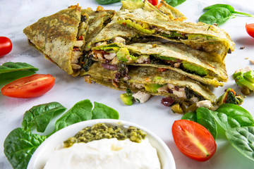 Chicken Quesadilla with avocado, tomatoes and jalapeno