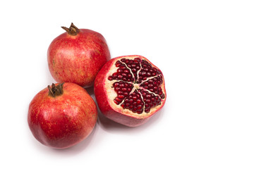 Sweet pomegranate isolated on white background.