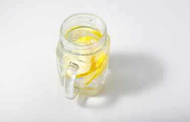 Glass of water with lemon. Detox