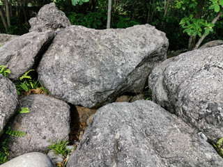 Texture of Big Stones laying on ground in the park