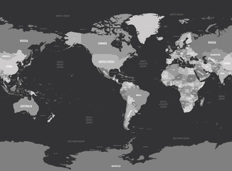 World map - America centered. Grey colored on dark background. High detailed political map of World with country, capital, ocean and sea names labeling