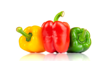 Fresh vegetables Three sweet Red, Yellow, Green Peppers isolated on white background.