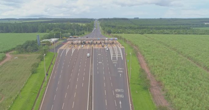 Aerial image highway toll plaza and speed limit, view of automatic paying lanes, non-stop.