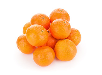 Pile of ripe tangerines on white background