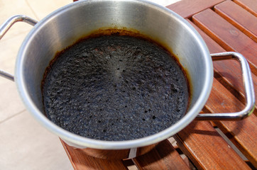 Pot with burnt food