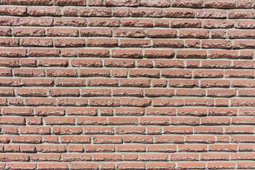 wall of orange bricks. For texture or background