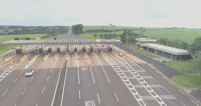 Aerial image highway toll plaza and speed limit, view of automatic paying lanes, non-stop.