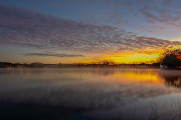 Fototapeta na wymiar Sunrise, on the lake.