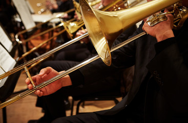 Playing the trombone in orchestra  © mnimage