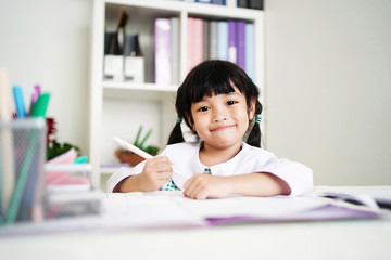 Happy student kid girl enjoy learning at school.  Education concept.  