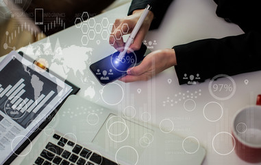 Double exposure of hands working on smartphone with forex chart hud. Stock market concept.	