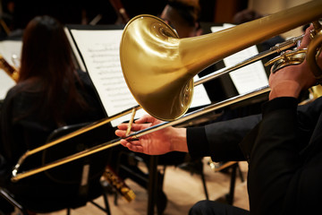 Playing the trombone in orchestra  © mnimage
