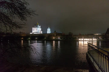 Night view at Holy Trinity cathedral, towers and battlement wall of Pskov Kremlin Krom . Pskov...