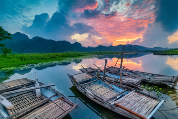 Landscape with boat in Van Long natural reserve in Ninh Binh, Vietnam