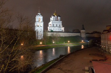 Night view at Holy Trinity cathedral, towers and battlement wall of Pskov Kremlin Krom . Pskov city, Pskov Region, Russia.