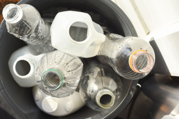Plastic recycling, plastic bottles and containers from household waste to recycle and re use