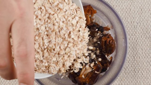 Energy Balls. Step by step recipe cooking. Ingredients are poured into a blender bowl. p2