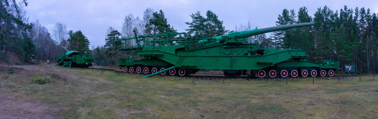 Fototapeta na wymiar Large-caliber railway artillery gun. Fort Red Hill, Krasnaya Gorka, Leningrad. Maritime railway artillery. Soviet weapons