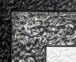 detail of ornamental picture frame, silver color.