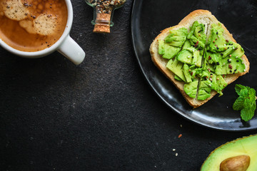 avocado sandwich, healthy food (bread toast snack) menu concept. food background. top view. copy space