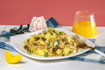 There are fried rice in Asia. They put scallops, squid and shrimps together to cook delicious food