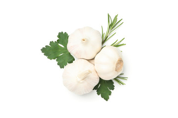Garlic bulbs and parsley isolated on white background, top view