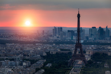 Fototapeta premium Panoramic aerial view of Paris, Eiffel Tower and La Defense business district. Aerial view of Paris at sunset. Panoramic view of Paris skyline with Eiffel Tower and La Defense. Paris, France.