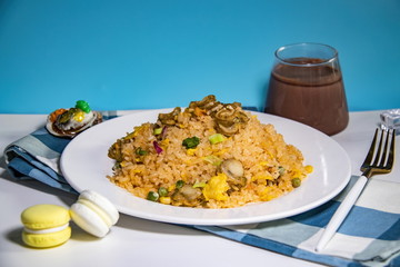 There are fried rice in Asia. They put scallops, squid and shrimps together to cook delicious food