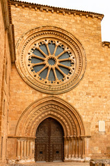  View of the entrance facade to the church with a huge rosette of the Cistercian monastery, Santa...