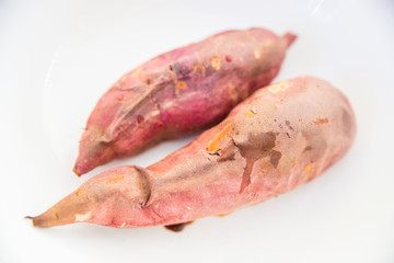 Baked sweet potato on white background - Image