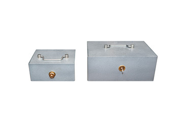 One closed, metal cash box with a key in the lock and the other with a drilled lock, isolated on white background with a clipping path.