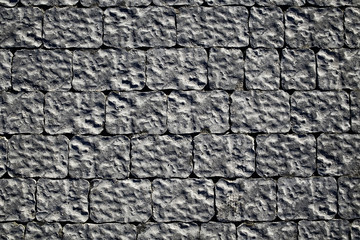 old stone pavement background / abstract pavement, large cobblestones, old road texture