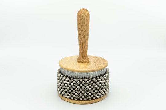 A cabasa in front of white background