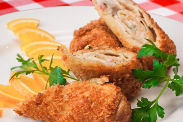 Chicken roll Cordon bleu, breaded dish closeup