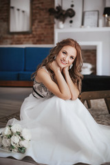 Fototapeta premium Beautiful bride with stylish make-up in white dress