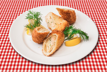 Chicken roll Cordon bleu, breaded dish closeup
