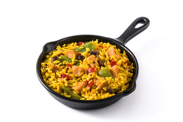 Fried rice with chicken and vegetables on frying iron pan isolated on white background