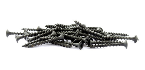 Black screws isolated on white. Pile of new black screws isolated on a white background. Steel screws on wood close-up. Fixing screws for construction on a white background.