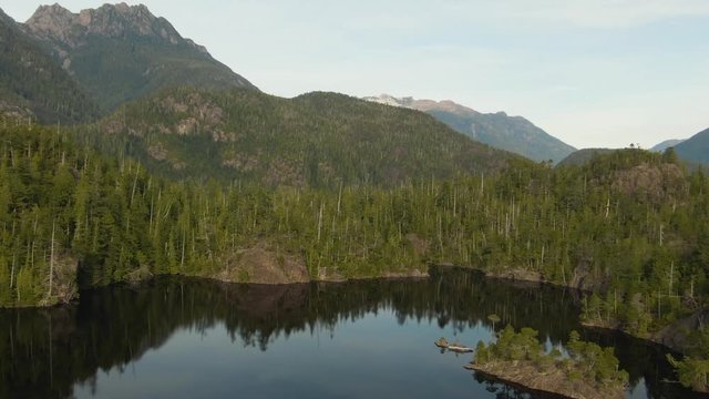 Beautiful Aerial Panoramic View of Larry Lake during a vibrant sunny day. Located on the West Coast of Vancouver Island near Tofino and Ucluelet, British Columbia, Canada.