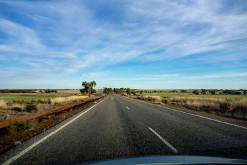 The view from a car with a bonnet in a Western Australia with a motion blur effect