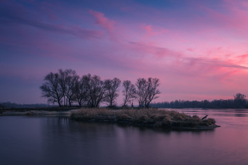 Obraz na płótnie Canvas Dusk over the island on the Vistula river near Otwock, Poland