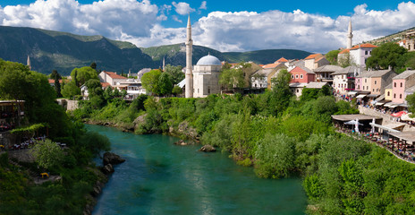 Mostar / Bosnia and Herzegovina: Panoramic view of old town in Mostar with Koski Mehmed Mosque and...